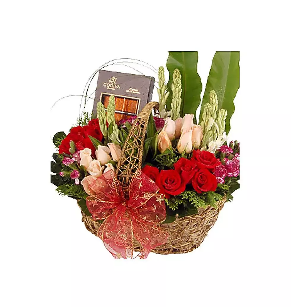 Mixed flower arrangement with chocolates